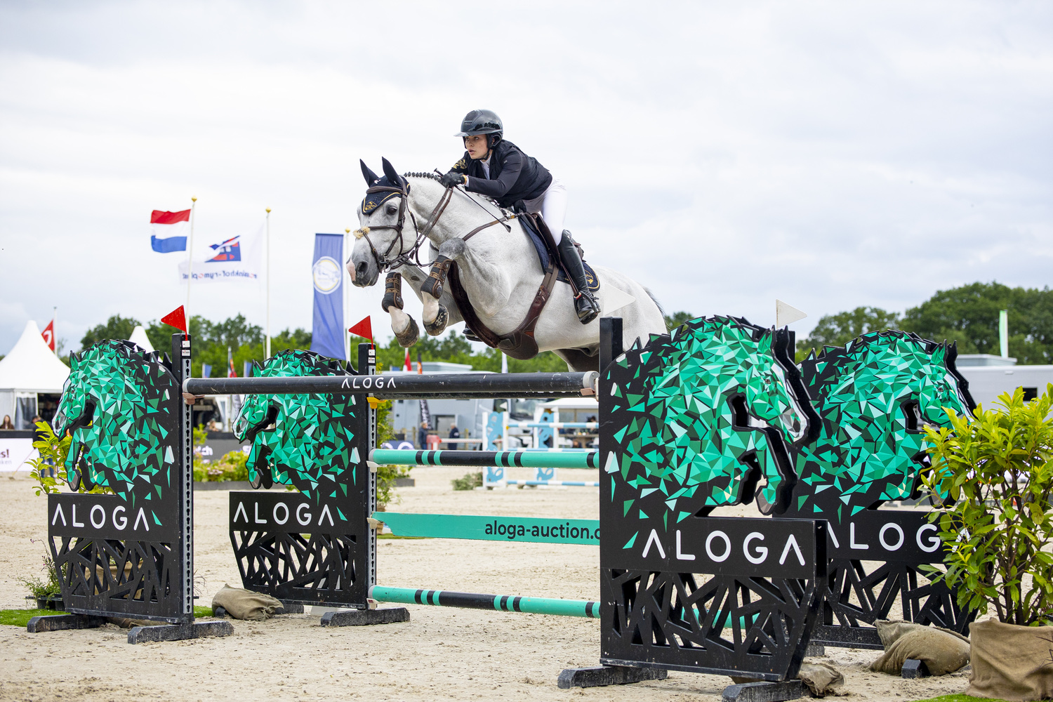 Emma Sophia Španko jumping a show jumping fence at the Aloga competition